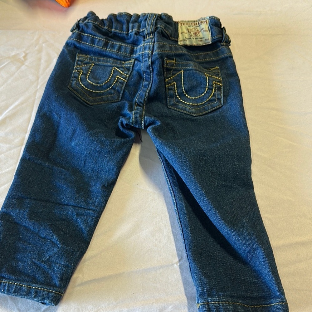 True Religion Blue Jeans with Signature Horseshoe Stitching